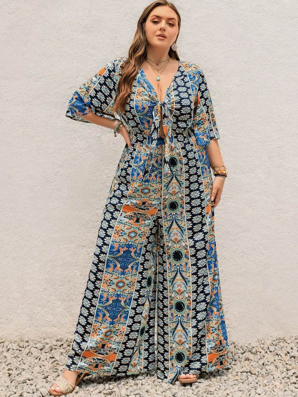 Plus Size Printed Half Sleeve Wide Leg Jumpsuit - Ultim8 Designs 4 U