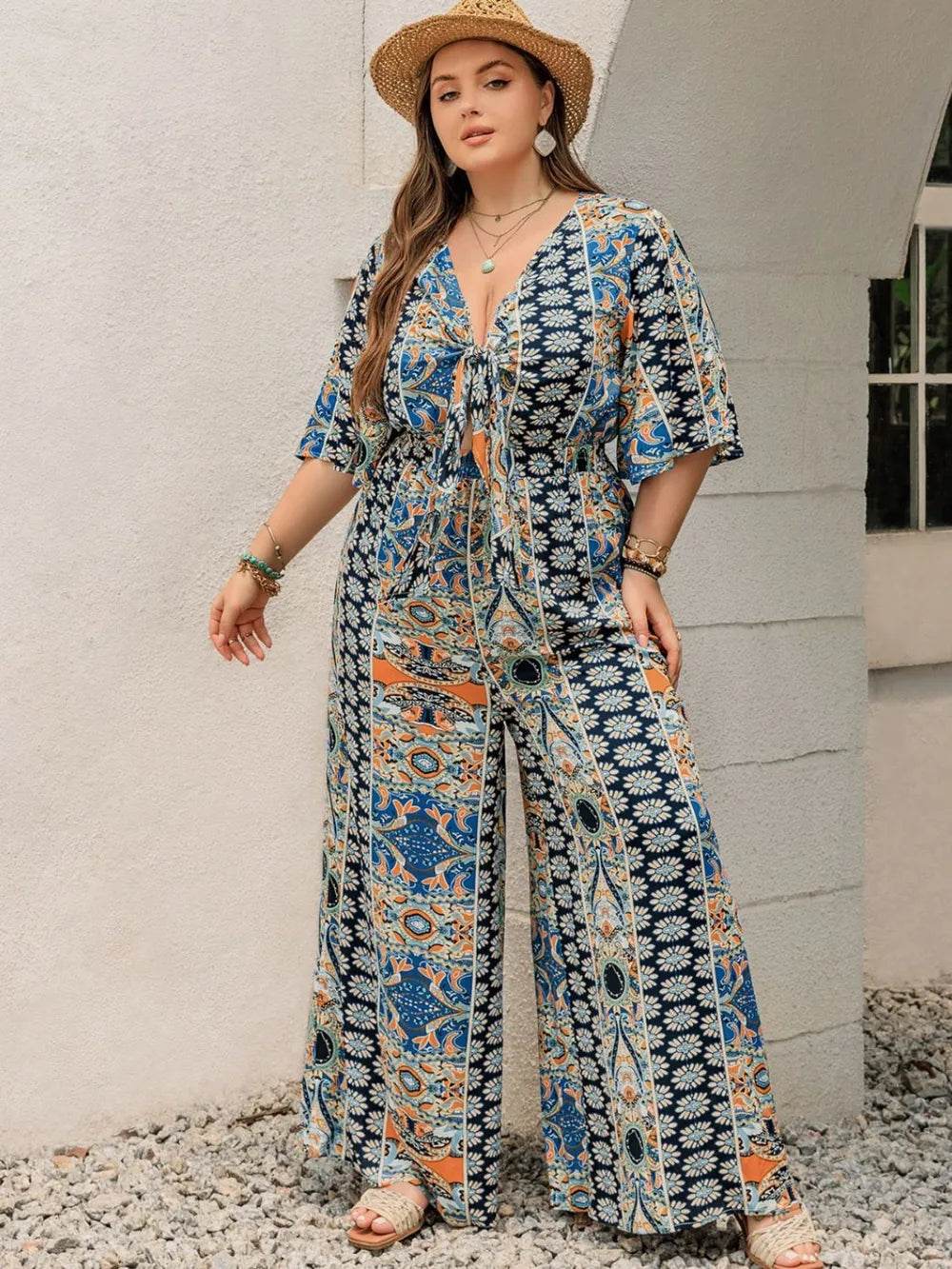 Plus Size Printed Half Sleeve Wide Leg Jumpsuit - Ultim8 Designs 4 U
