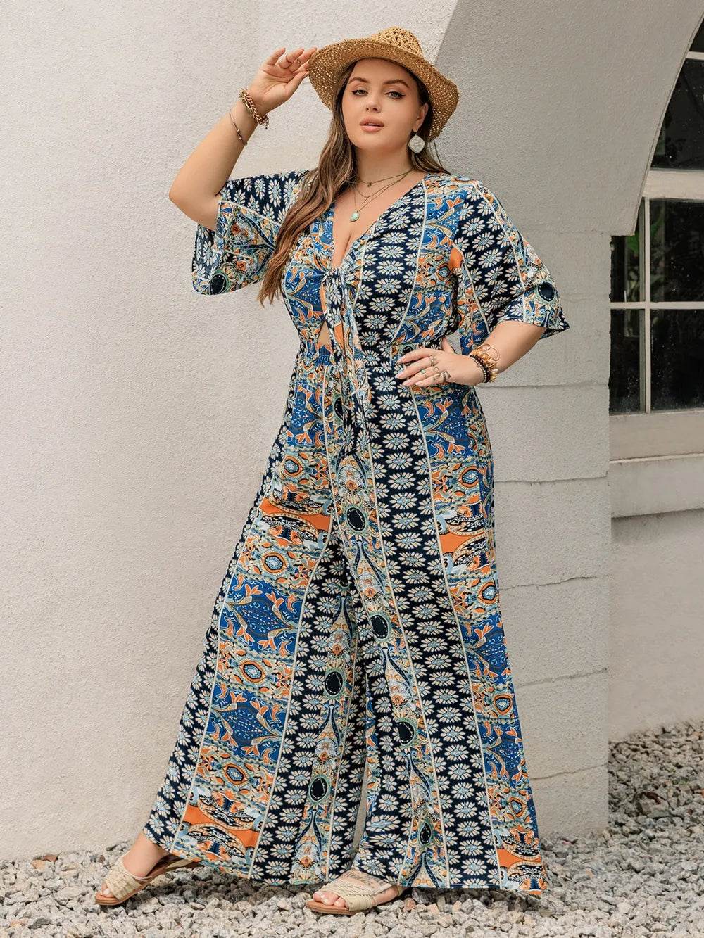 Plus Size Printed Half Sleeve Wide Leg Jumpsuit - Ultim8 Designs 4 U